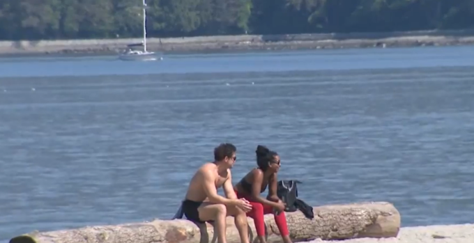 Vancouver skyline during summer heatwave highlighting concerns over city budget and extreme heat response planning