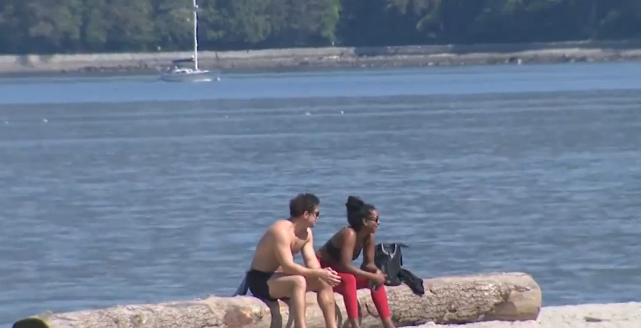Vancouver skyline during summer heatwave highlighting concerns over city budget and extreme heat response planning
