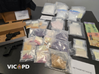Evidence and seized illegal drugs displayed during a Victoria police enforcement operation in British Columbia.