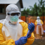 Healthcare workers wearing protective suits during an Ebola outbreak response in Central Africa