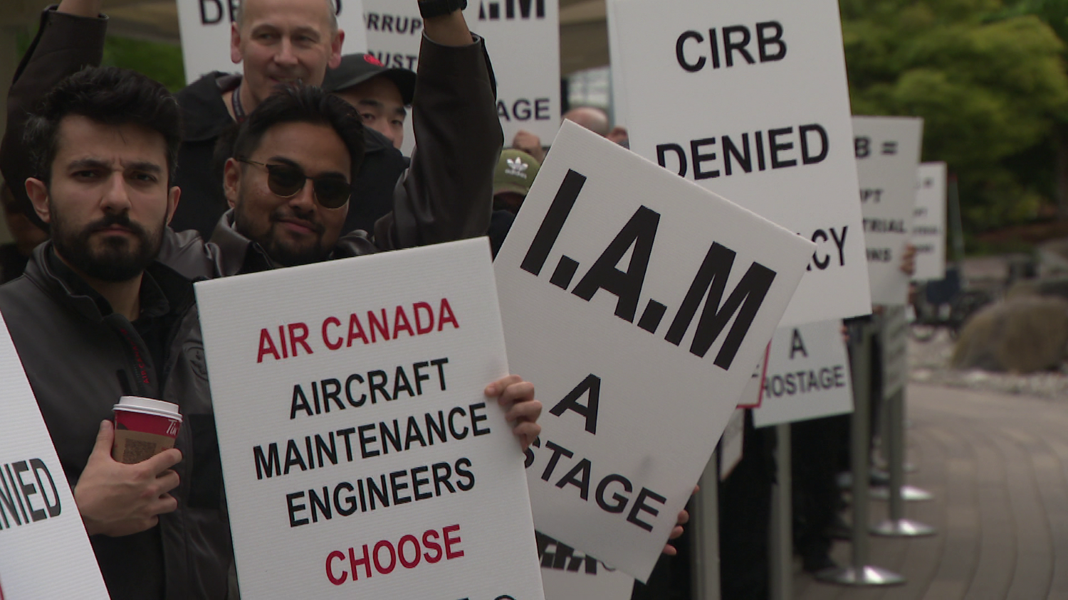 Air Canada aircraft parked at Vancouver International Airport during worker rally