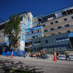 Burnaby Hospital building with ongoing redevelopment plans delayed amid community concerns over healthcare infrastructure.
