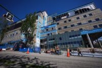 Burnaby Hospital building with ongoing redevelopment plans delayed amid community concerns over healthcare infrastructure.