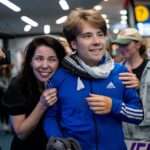 Three Vancouver activists arriving home after detention during a Gaza-bound humanitarian flotilla mission intercepted by Israeli authorities.