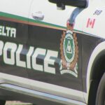 Emergency responders at a two-vehicle crash scene in Delta British Columbia