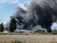 Firefighters battling a large barn fire in Delta, British Columbia