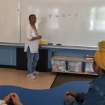 Students and parents discussing a Punjabi language initiative at a British Columbia elementary school amid online debate.