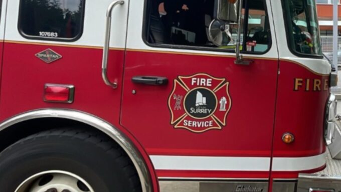 Firefighters responding to a house fire in Surrey’s Whalley neighbourhood