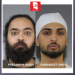 Surrey Police officers investigating a targeted shooting linked to extortion threats in Surrey, British Columbia.