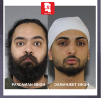 Surrey Police officers investigating a targeted shooting linked to extortion threats in Surrey, British Columbia.