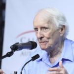 Dr. Frank Hayden speaking at a Special Olympics event in Canada