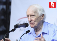 Dr. Frank Hayden speaking at a Special Olympics event in Canada