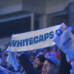 Vancouver Whitecaps supporters gather outside BC Place Stadium during campaigns to keep the MLS club in Vancouver amid relocation concerns.