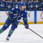 Vancouver Canucks players during an NHL game in Vancouver