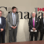 Large LNG facility and pipeline infrastructure in British Columbia connected to upcoming natural gas investment decisions in Canada.