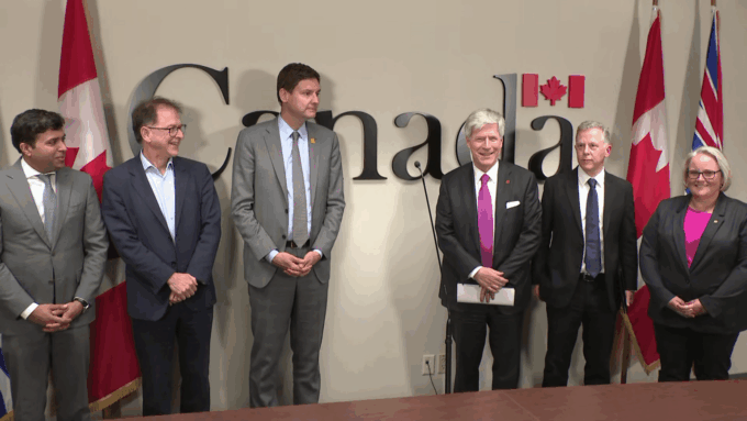 Large LNG facility and pipeline infrastructure in British Columbia connected to upcoming natural gas investment decisions in Canada.