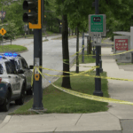 Police vehicles and officers responding to an incident near Holland Park and Old Yale Road in Surrey, British Columbia.