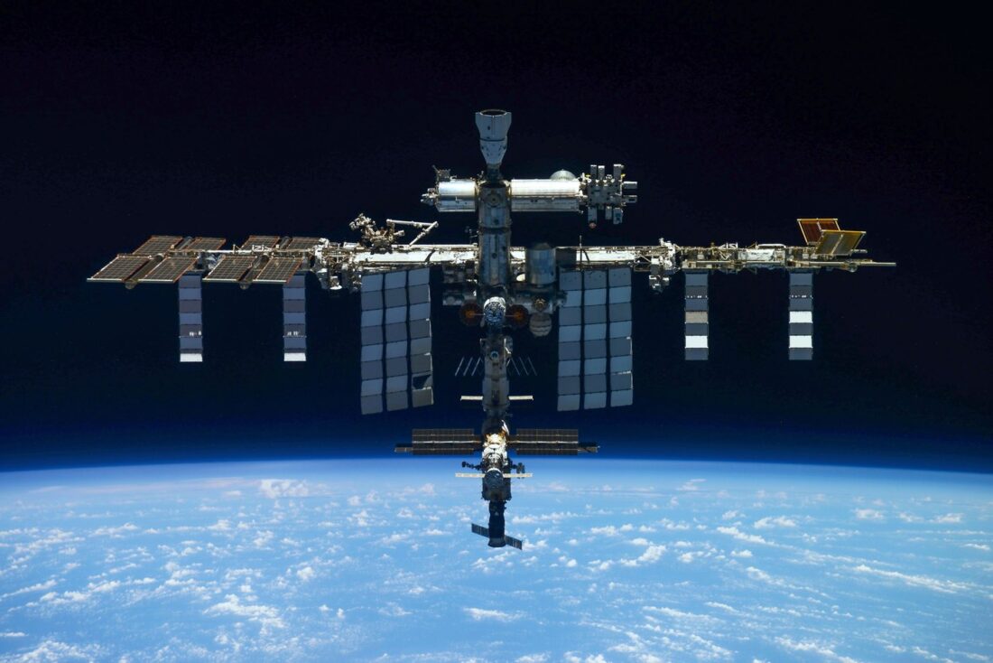 Interior view of International Space Station modules representing NASA emergency response to suspected air leak in orbit.