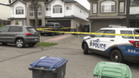 Surrey police investigating an extortion-linked shooting that resulted in additional criminal charges against two suspects.